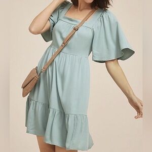 Brand new Maurice’s Light Flutter Sleeve teal Dress with pockets.